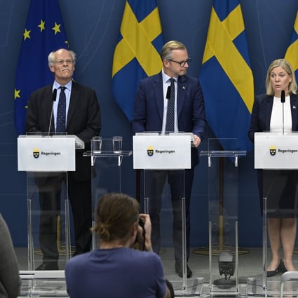 From left to right: Governor of Sveriges Riksbank, the central bank of Sweden, Stefan Ingves, Sweden’s Finance Minister Mikael Damberg, Prime Minister Magdalena Andersson and Director General of Finansinspektionen, Sweden’s financial supervisory authority, Erik Thedeen attend a news conference in Stockholm. Photo:  EPA-EFE