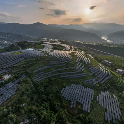 Solar panels are scattered among Sichuan pepper fields in Bijie, in China’s southwestern Guizhou province, on August 16. New research shows China could reach 80 per cent carbon-free electricity as early as 2035 without increasing costs or sacrificing reliability. Photo: AFP