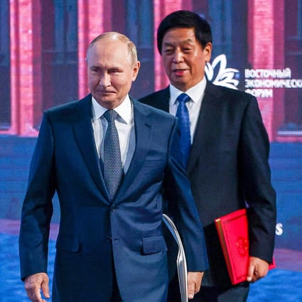 Russian President Vladimir Putin and China’s No 3 official, Li Zhanshu, arrive for the plenary session of the Eastern Economic Forum in Vladivostok on Wednesday. Photo: Tass via AP