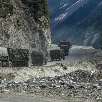 An Indian Army convoy carrying reinforcements and supplies travels towards Leh through Zoji La, a high mountain pass bordering China in Ladakh, India, in June 2021. Photo: TNS