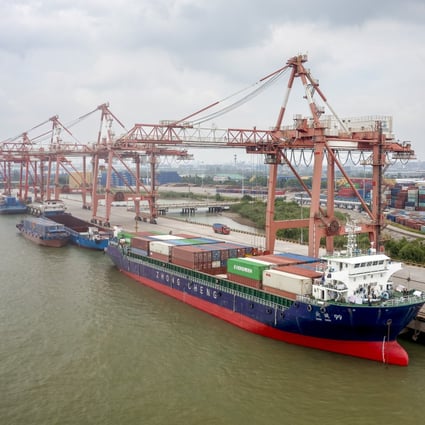 Exports are loaded onto a Chinese shipping vessel at a port in Jiangsu province. Shipping agents across the country are reporting plummeting demand for exports. Photo: EPA-EFE