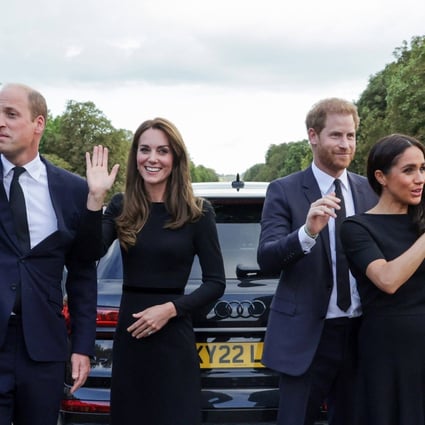 (L-R) Britain’s Prince William, Prince of Wales, Britain’s Catherine, Princess of Wales, Britain’s Prince Harry, Duke of Sussex, Britain’s Meghan, Duchess of Sussex, wave at well-wishers on the Long walk at Windsor Castle on Saturday. Photo: Pool via AFP