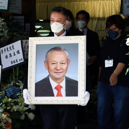 Top Hong Kong officials, politicians pay last respects at funeral of