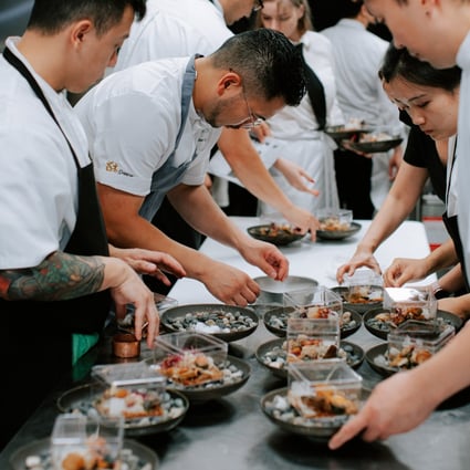 Vancouver-based chef William Lew (second from left) prepares a course for the Chinese Restaurant Awards’ dining series “Hong Kong Renaissance”. Photo: Chinese Restaurant Awards