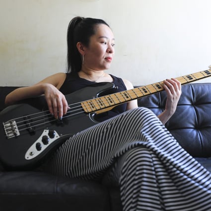 Musician Kylie Chow Kit-yee at her home in the Kowloon neighbourhood of Yau Ma Tei. As Hong Kong’s live-music ban continues, indie musicians are struggling with mental health issues and debt. Photo: Xiaomei Chen