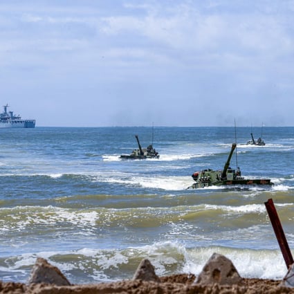 Amphibious armoured vehicles under the People’s Liberation Army Eastern Theatre Command take part in an assault wave formation training exercise in Zhangzhou, Fujian province, last month. Photo: Reuters