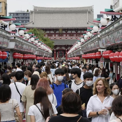 Tourists throng the Nakamise shopping street in downtown Tokyo on September 7. As the yen plunges to its lowest level in decades, the Japanese economy is only now close to shaking off the deflationary impact of the Plaza Accord on currencies signed in 1985. Photo: EPA-EFE