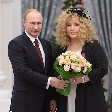 Russian President Vladimir Putin and pop singer Alla Pugacheva, one of the nation’s most famous people, in 2014. Photo: AP