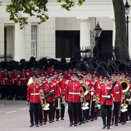 Rather than colonial legacies or memories, many Asians said they were drawn by the pomp and ceremony of the funeral at Westminster Abbey. Photo: AP