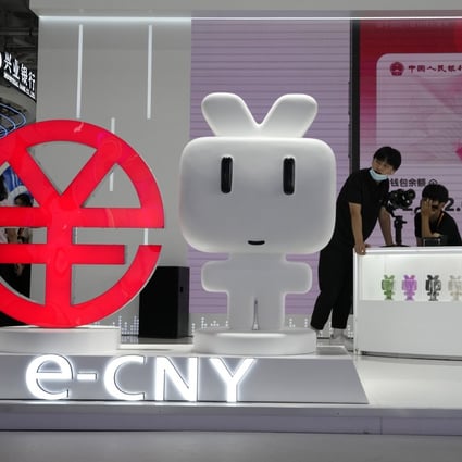 Representatives staff a booth promoting the e-CNY, China’s digital currency, during the China International Fair for Trade in Services (CIFTIS) in Beijing on September 2, 2022. Photo: AP