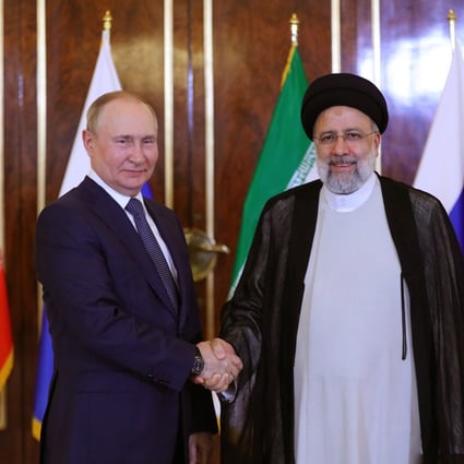 Iranian President Ebrahim Raisi (right) greets his Russian counterpart Vladimir Putin during a meeting in Tehran, Iran, on July 19. Photo: EPA-EFE
