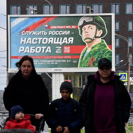 A military recruitment billboard in St Petersburg with the slogan “Serving Russia is a real job”. Photo: AFP