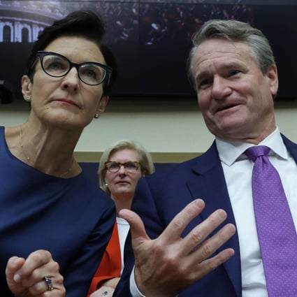 Bank of America CEO Brian Moynihan talks to Citigroup CEO Jane Fraser ahead of a hearing before the House Committee on Financial Services in Washington on Wednesday. Photo: AFP