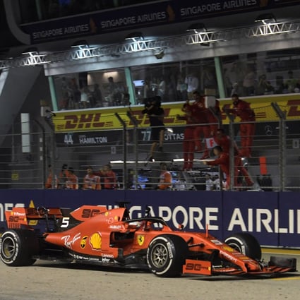 Singapore Grand Prix brings Formula 1 fun and high prices to the city. Above: Ferrari’s Sebastian Vettel after winning the Singapore Grand Prix in 2019. Photo: Roslan Rahman/AFP