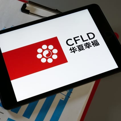 A tablet shows China Fortune Land Development’s logo. Photo: Shutterstock
