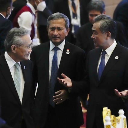 Chinese Foreign Minister Wang Yi (right) chats with Singapore’s Foreign Minister Vivian Balakrishnan (centre) and Thailand’s Foreign Minister Don Pramudwinai at the Asean-China Ministerial Meeting in Phnom Penh, Cambodia in August 2022. Photo: AP