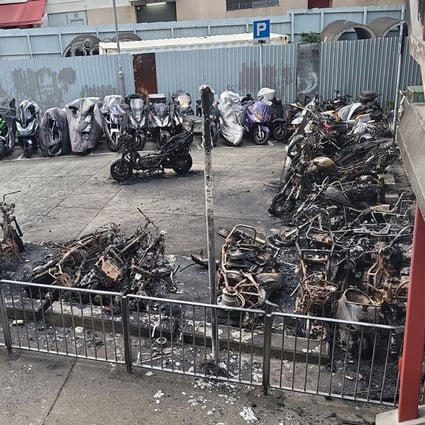 Motorcycles parked under a footbridge in Hong Kong were reduced to charred frames in an arson attack in the early hours of Tuesday. Photo: Facebook