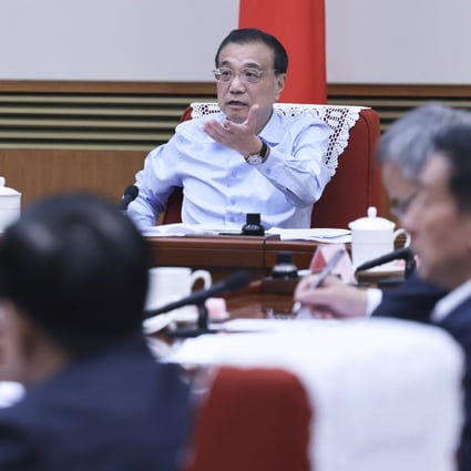Premier Li Keqiang speaks at a meeting on government work regarding economic stabilisation for the fourth quarter on Wednesday in Beijing. Photo: Xinhua