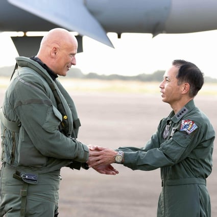 Shunji Izutsu (right) chief of staff of the Japan Air Self-Defence Force, shakes hands with Lieutenant General Ingo Gerhartz, chief of the German Air Force, at JASDF’s Hyakuri Air Base in Omitama, Ibaraki Prefecture, northeast of Tokyo, on Wednesday. Photo: Kyodo