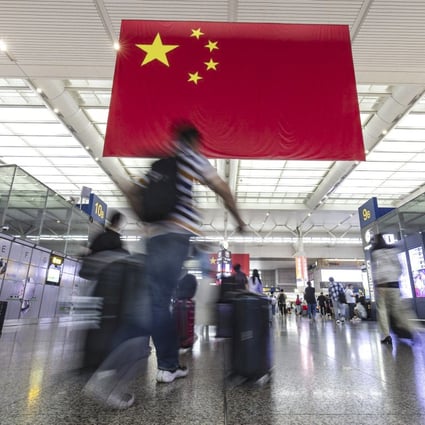 Travellers at Shanghai Hongqiao Railway Station on Friday, ahead of the National Day “golden week” holiday. Photo: Bloomberg