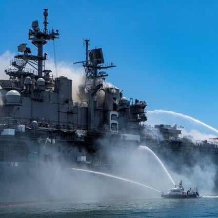 Port of San Diego Harbour Police Department boats combat a fire on board the USS Bonhomme Richard at Naval Base San Diego in California in July 2020. Photo: US Navy via Reuters