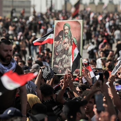 Anti-government protesters gather in Tahrir Square in Baghdad, Iraq on Saturday during a demonstration marking the third anniversary of the 2019 anti-government protests. Photo: dpa