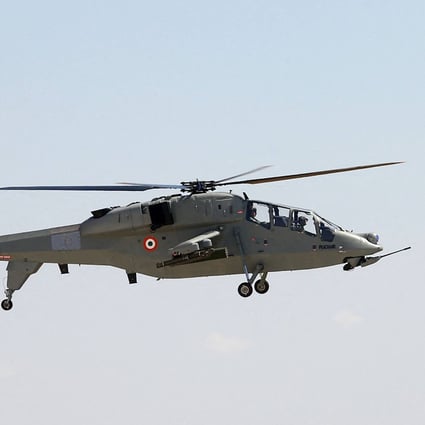 India unveiled its first batch of locally-made attack helicopters, designed primarily for use in high-altitude areas like the Himalayas where its troops clashed with China in 2020. Photo: Indian Ministry of Defence/AFP
