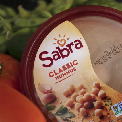 A “best before” date on a container of hummus sold in North American stores. Manufacturers use such dates to indicate until when the contents are at peak freshness, but many customers interpret “best before” to mean “use by” and throw items away, which contributes to the global problem of food waste. Photo: AP /Michael Dwyer