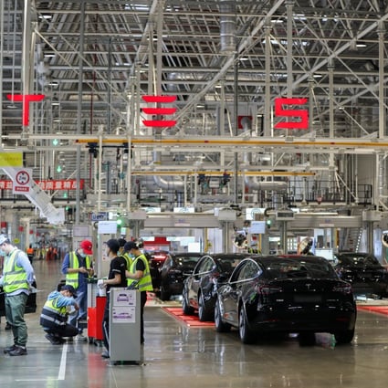 Employees work at the Tesla Gigafactory in Shanghai, where the capacity has been expanded to 1 million units a year. Photo: Xinhua