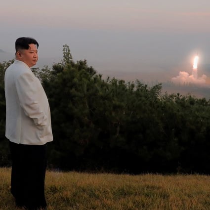 North Korea’s leader Kim Jong-un oversees a missile launch at an undisclosed location in North Korea. Photo: KCNA via Reuters