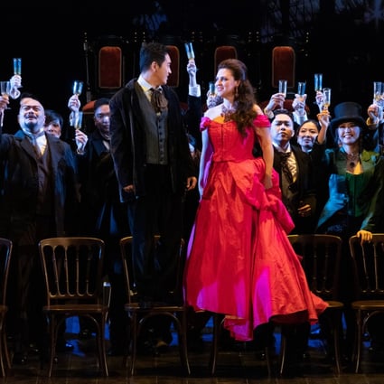 The ballroom scene in Act 1 of Opera Hong Kong’s production of La Traviata with Violetta (Venera Gimadieva) and Alfredo (Kang Wang). Photo: Opera Hong Kong