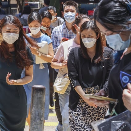 Pedestrians are seen wearing face masks in Central. Photo: Nora Tam
