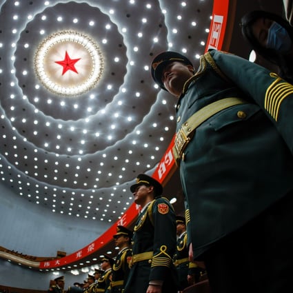 Military band members stand at attention during the opening ceremony of the 20th national congress of the Communist Party of China, at the Great Hall of the People in Beijing on October 16. Photo: EPA-EFE 