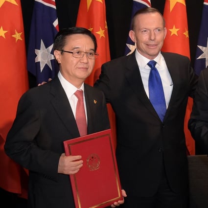 China’s then commerce minister Gao Hucheng (left) and Australia’s then prime minister Tony Abbott (centre) and minister for trade Andrew Robb pose for a photo after signing a free trade agreement between the two countries on June 17, 2015, in Canberra, Australia. The era of enthusiasm and optimism from the wider world over engagement with China appears to be at an end, representing a loss for all sides. Photo: Getty Images