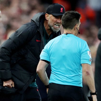 Liverpool manager Jurgen Klopp remonstrates with the assistant referee. Photo: Reuters