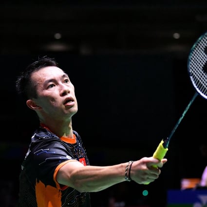Angus Ng Ka-long of Hong Kong hits a return at the Badminton World Championships in Tokyo. Photo: AFP