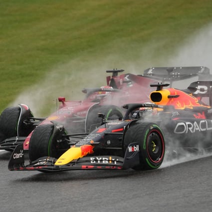 Ferrari’s Charles Leclerc (back) vies with Red Bull’s Max Verstappen during the Japan Grand Prix. Photo: Xinhua