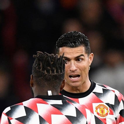 Cristiano Ronaldo (right) talks to Manchester United teammate Fred during the warm up before their side’s  Premier League game against Tottenham at Old Trafford. Photo: AFP