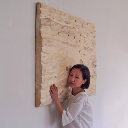 Hong Kong artist Jaffa Lam with her work “A Piece of Good Water III” (2017) at Axel Vervoordt Gallery in Wong Chuk Hang. Photo: Axel Vervoordt Gallery 