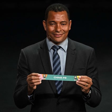 Former Brazil player Gilberto Silva displays the country China during the football draw ceremony for the Australia and New Zealand 2023 Fifa Women’s World Cup at the Aotea Centre in Auckland on October 22, 2022. Photo: AFP