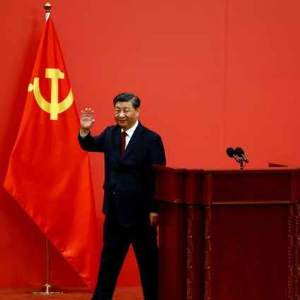 President Xi Jinping waves after delivering his speech as new Politburo Standing Committee members meet the press following the 20th Communist Party congress. Photo: Reuters