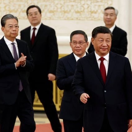 Members of the 20th Politburo Standing Committee Xi Jinping, Li Qiang, Zhao Leji, Wang Huning, Cai Qi, Ding Xuexiang and Li Xi arrive to meet the media following the 20th National Congress of the Communist Party of China, at the Great Hall of the People in Beijing on Sunday. Photo: Reuters