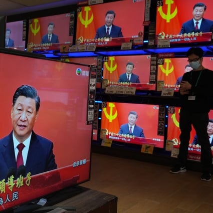 TV screen displaying news reporting of Chinese President Xi Jinping with his new team meet the media in Beijing at Quarry Bay department store on 23 October 2022. Photo: Robert Ng