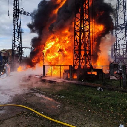 Firefighters work to put out a fire at energy infrastructure facilities in Ukraine, damaged by a Russian missile strike. Photo: Reuters