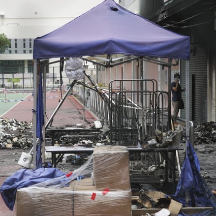 The suspect (not pictured) is accused of taking part in an arson attack on a government Covid-19 testing centre in Tsuen Wan last year, a source has said. Photo: Edmond So