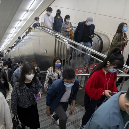 Commuters in a subway station in Beijing on April 22. Photo: AP