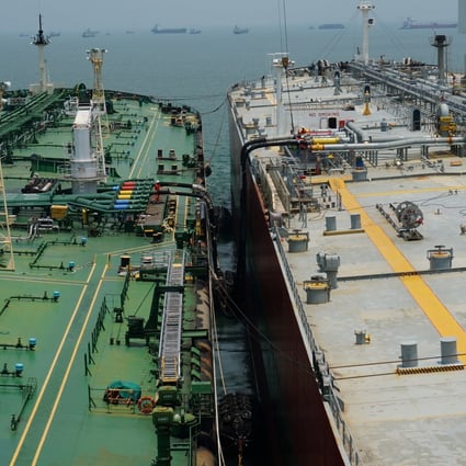 An oil tanker is seen during a marine blending at the sea off Singapore. Photo: SK Trading International/Handout via Reuters/File