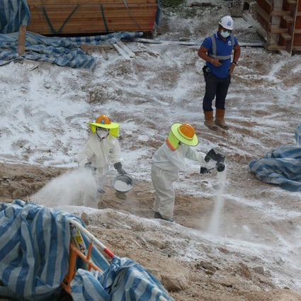 A construction site in Sham Shui Po is disinfected after soil samples were found to contain a bacterium that can cause melioidosis. Photo: Yik Yeung-man