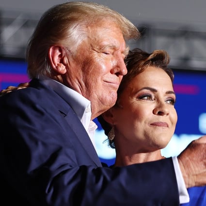 Kari Lake, pictured with Donald Trump, is a former news anchor who is considered a Republican rising star. Photo: AFP