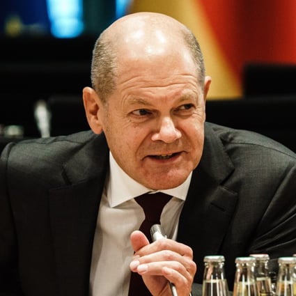 German leader Olaf Scholz under scrutiny as he leads business ...